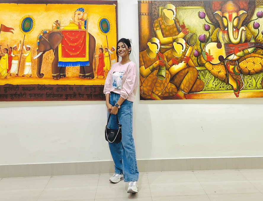 image of me, attending an art workshop of my friends at my hometown jamshedpur, there's 1 painting of famous Artist Anupam Pal and other 1 with Elephant is of Artist Saurav Sinha