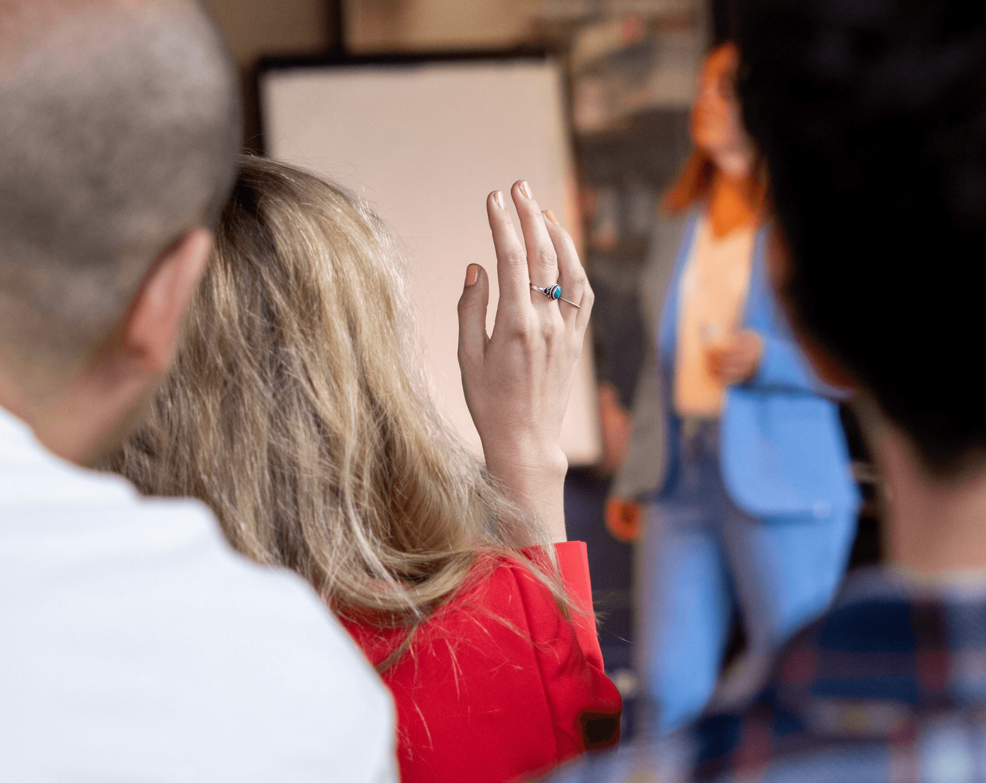 Woman raising her hand