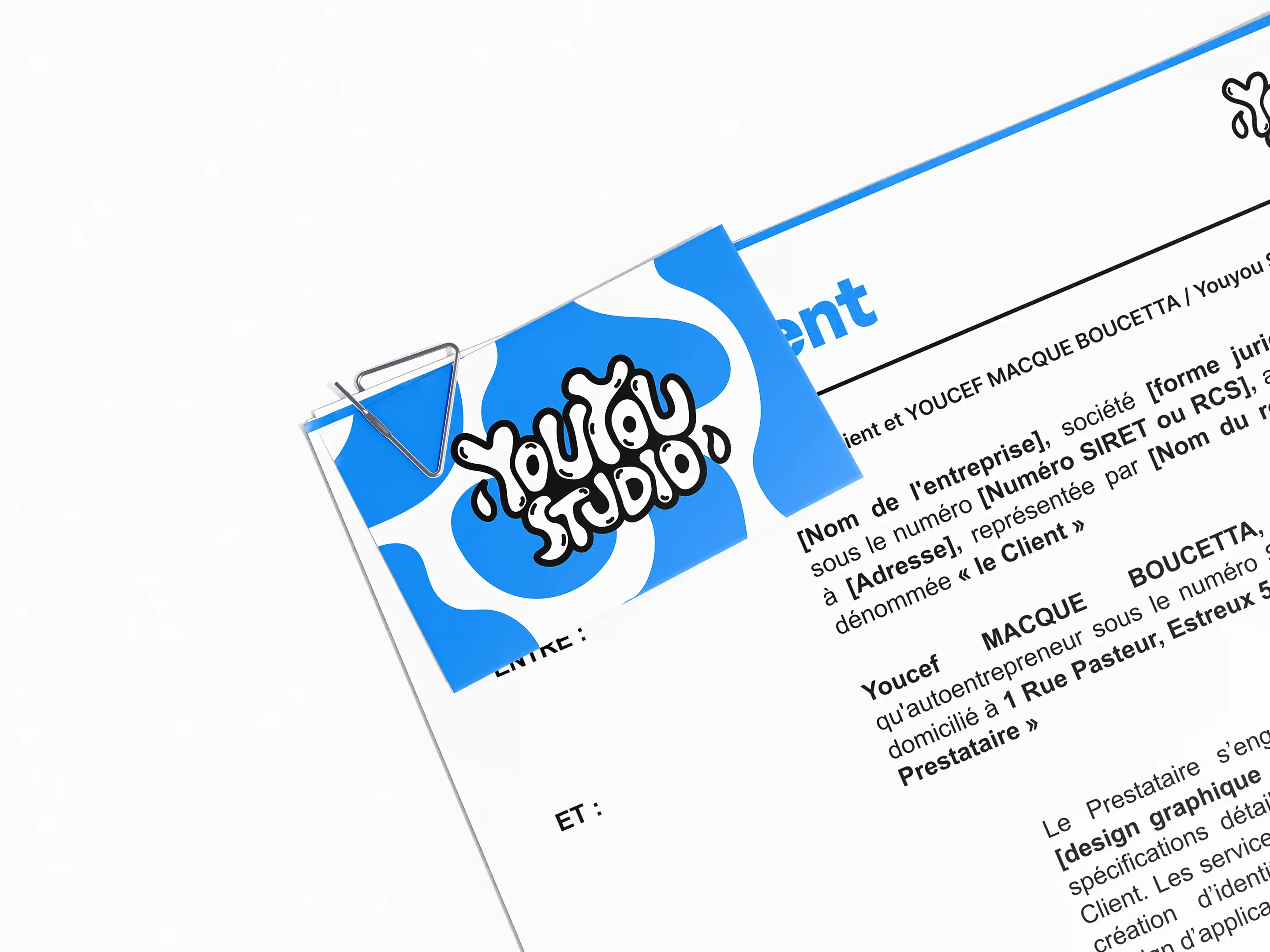 Document contractuel professionnel Youyou Studio - contrat entre Youcef Macque Boucetta auto-entrepreneur designer graphique et client, avec logo Youyou Studio en motif organique bleu et blanc attaché par trombone bleu en haut à gauche, texte juridique détaillant nom entreprise, SIRET, adresse et prestations de design graphique