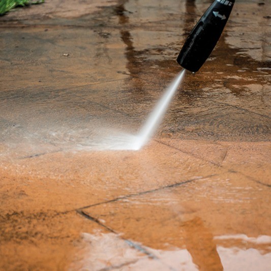 Drive cleaning with pressure washer