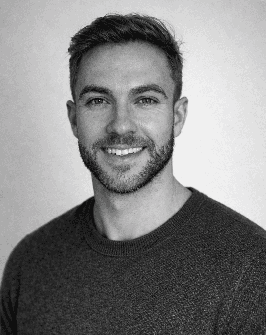 My Story: A portrait of a Yanick Jimenez (product designer) smiling with short brown hair and a light beard, set against a soft green background. The text below mentions that he is originally from Costa Rica and now lives in Quebec, Canada.