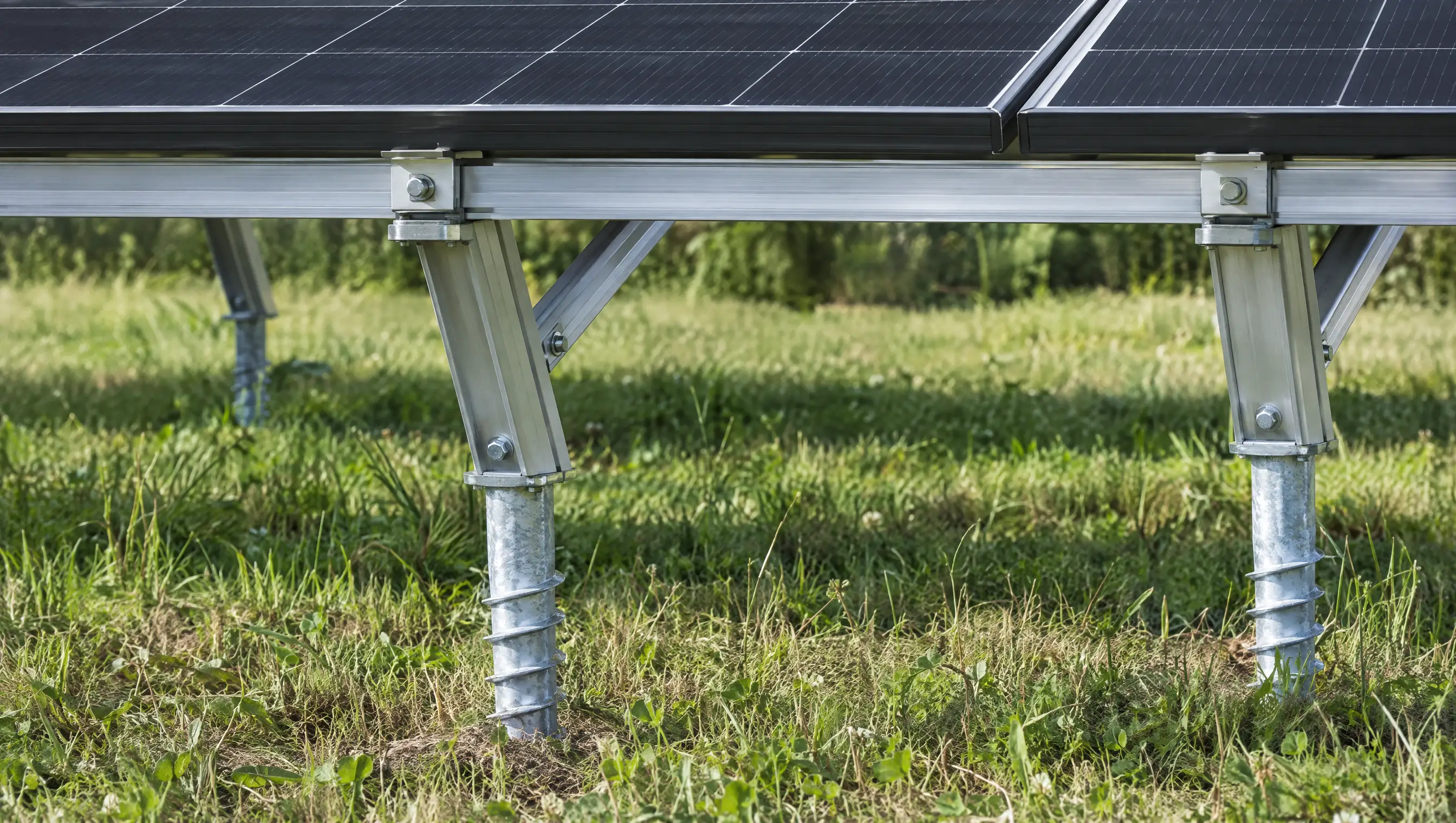 Ground screws and an aluminium frame supporting a ground-mounted solar array