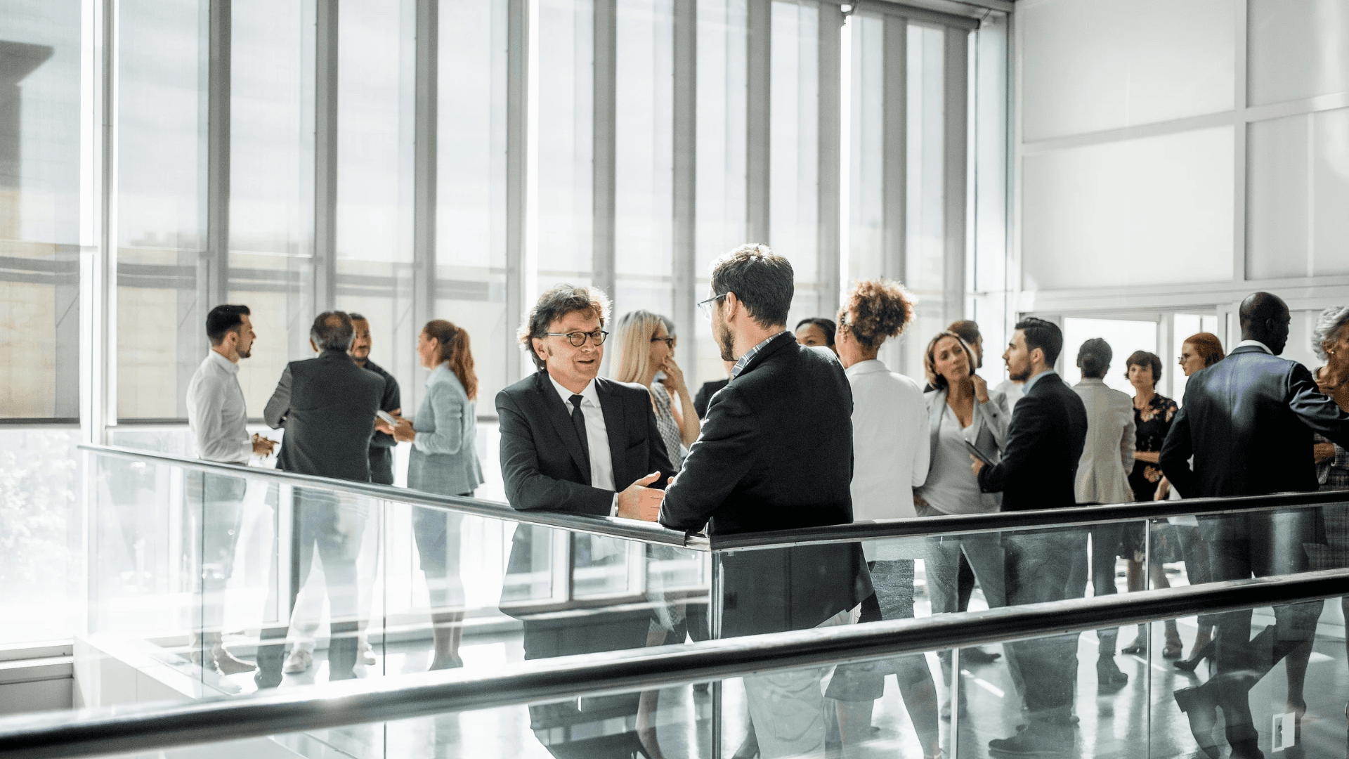 man drawing on dry-erase board