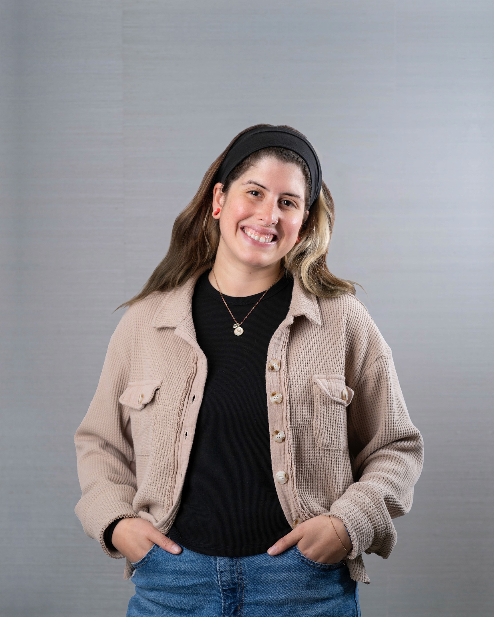 Young woman smiling brightly.