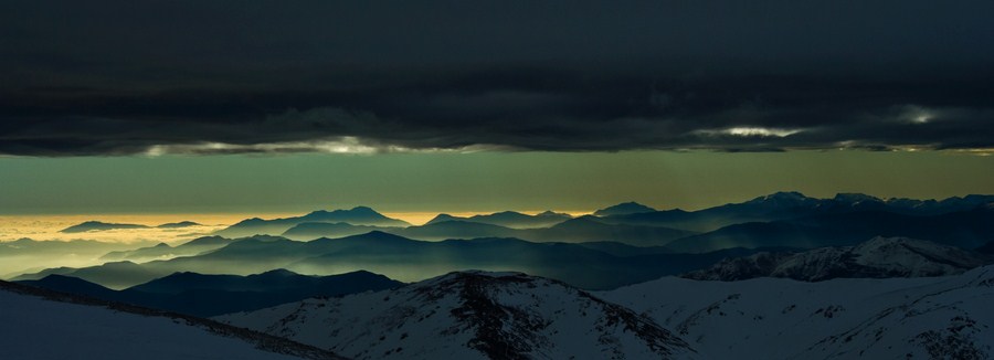 Drone shot of a running track at night