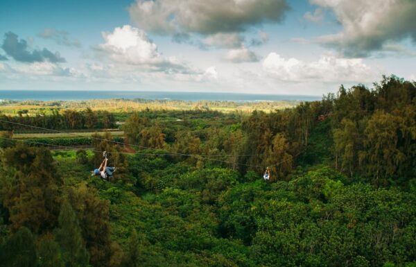 two people ziplining in Oahu