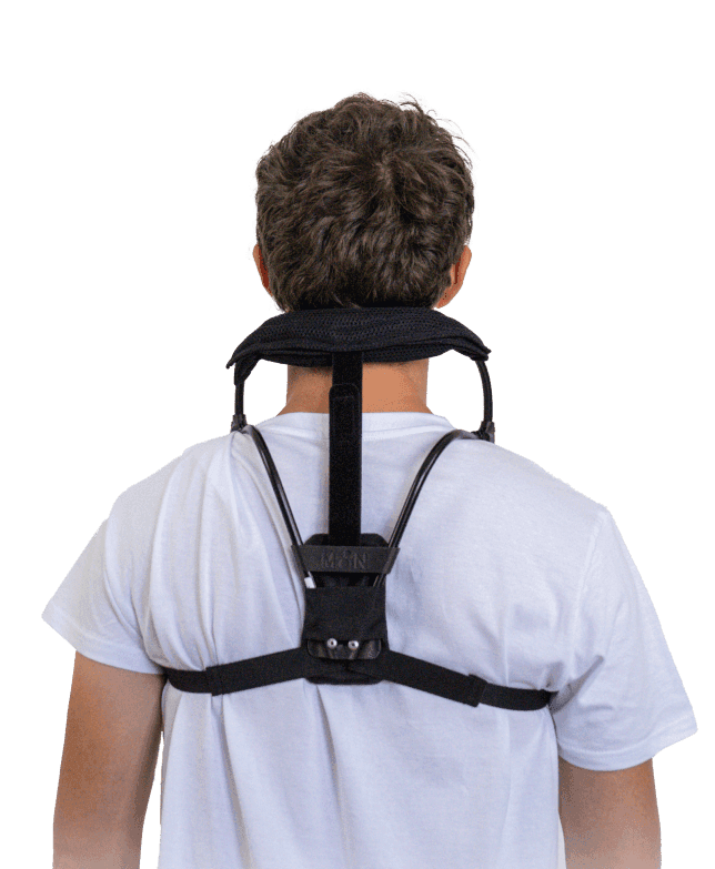 Rear view of a person wearing the Moon exoskeleton, designed to provide neck support and reduce cervical tension during head-up work.