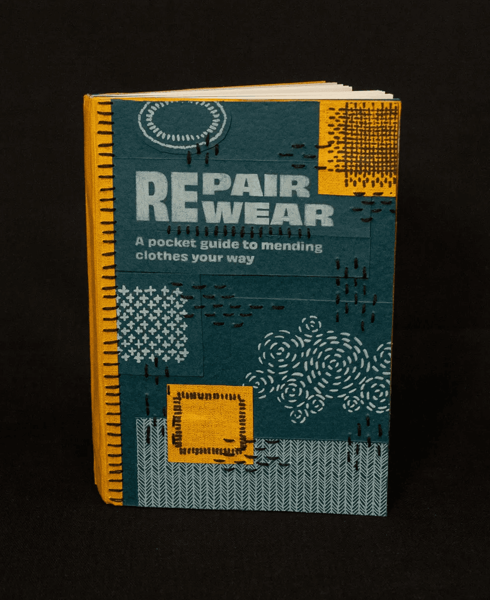 Mending guide cover in a patchwork style with thread stitching