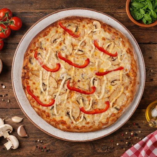 pizza with green leaf vegetable