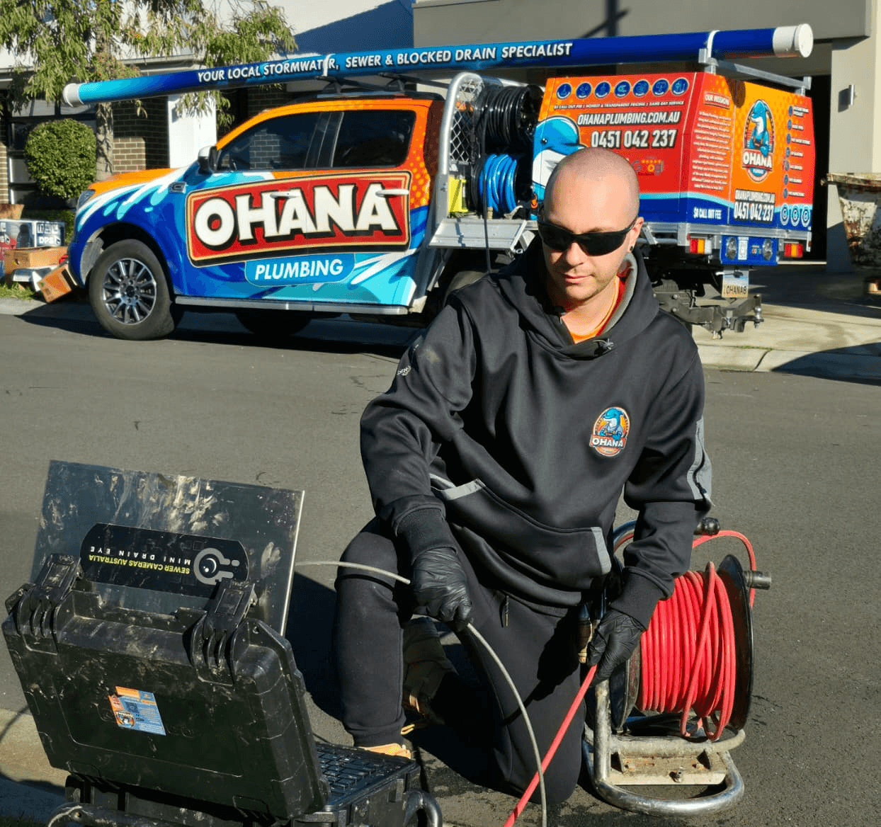 Ohana Plumbinig Sydney in front of the work vehicle