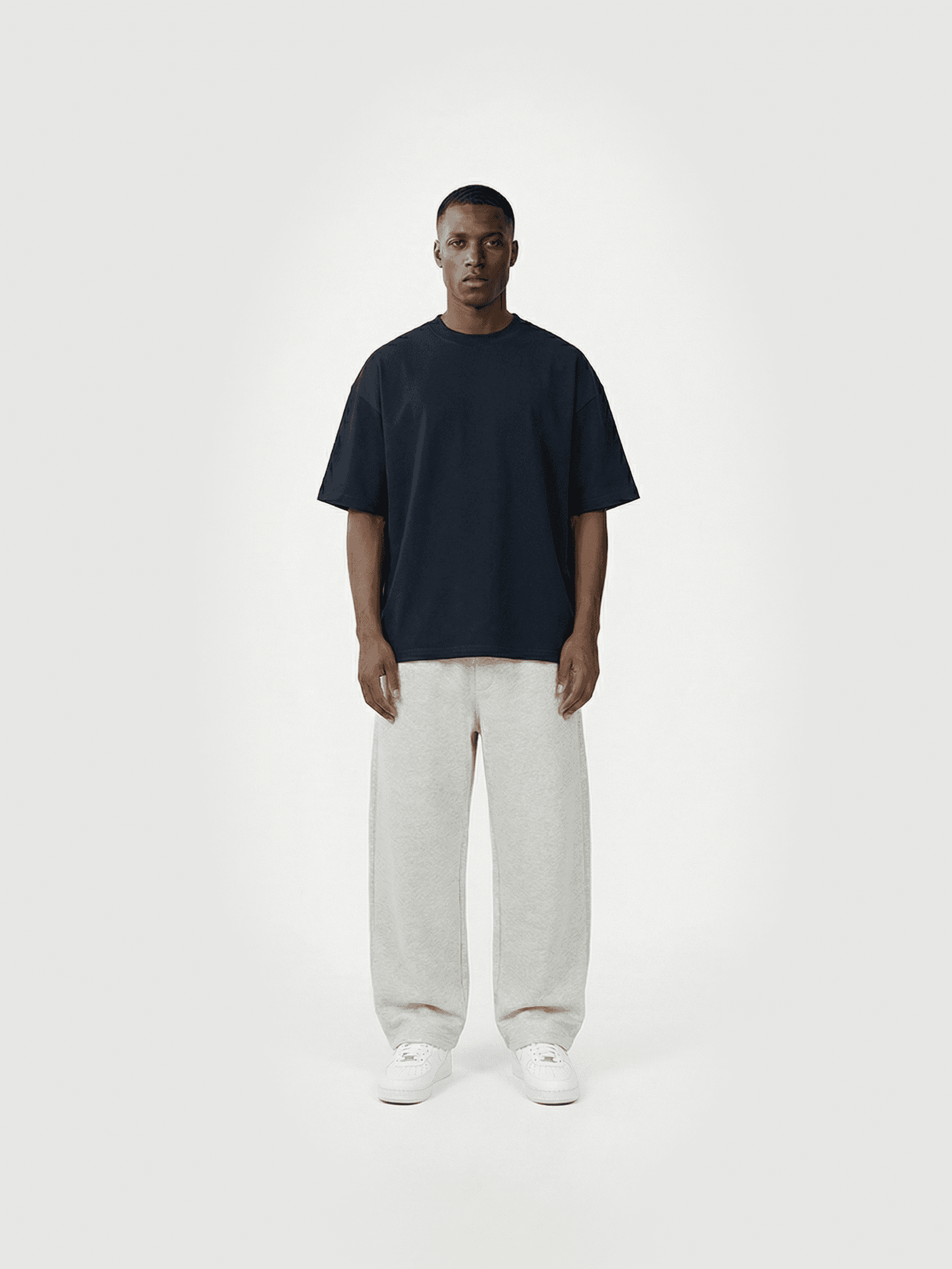 Heavyweight classic crew T-shirt in navy — front view on model.