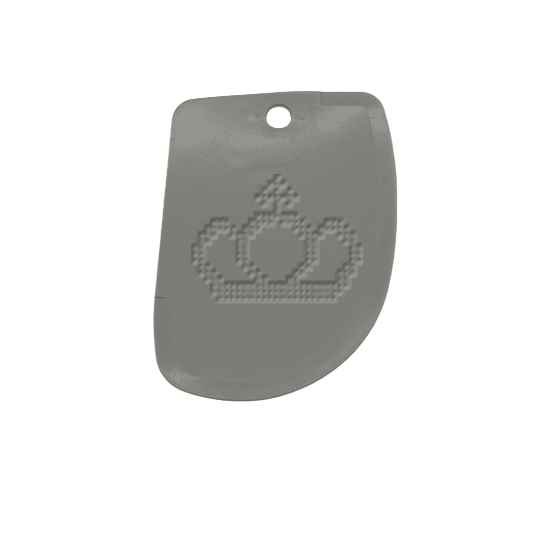A simple gray texture tool with a crown design in the center.