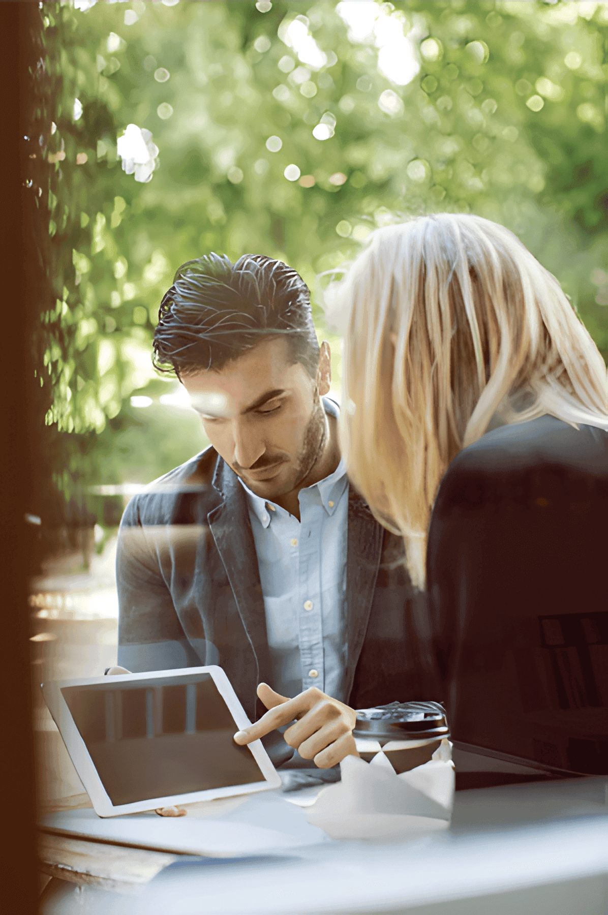 Close-up of a tree stump showing growth rings and a textured brown wood surface.