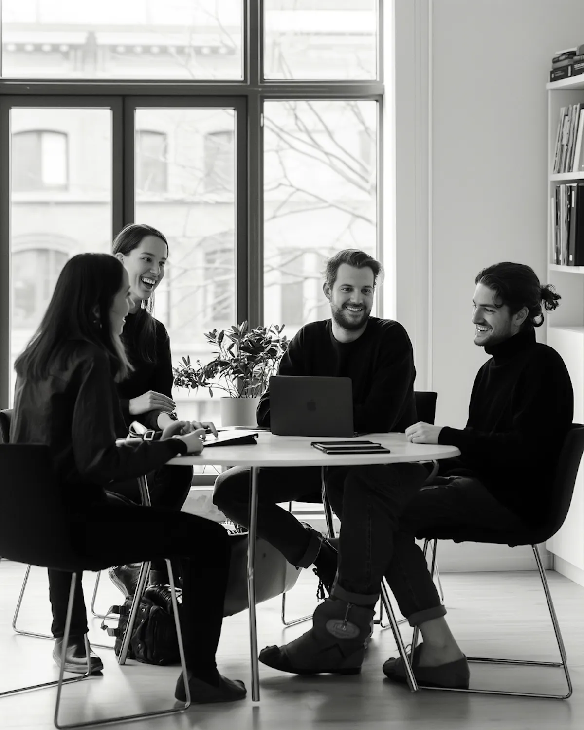 A group of founders sitting around a table