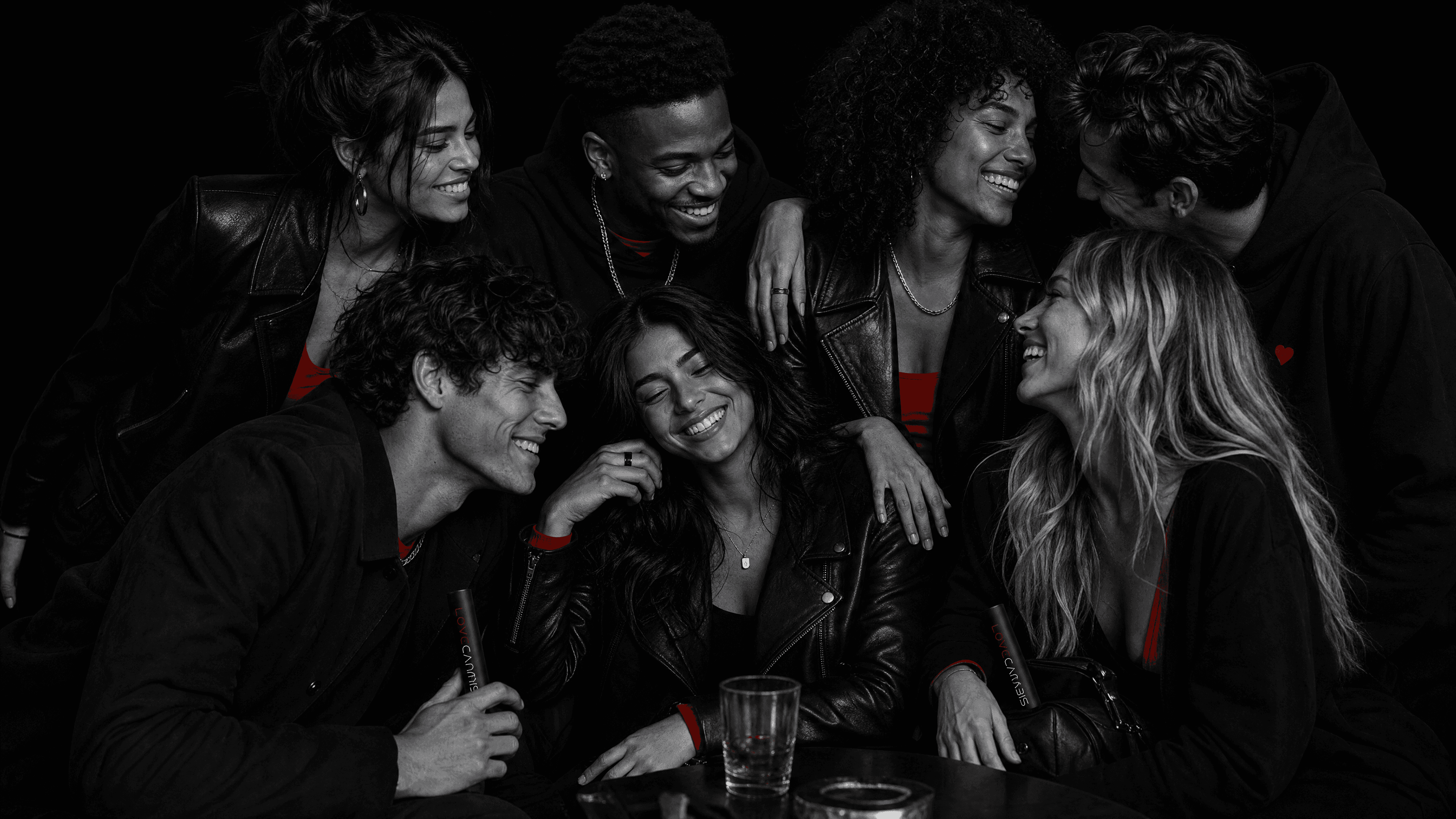 Friends sharing premium Love Cannabis cannabis pre-rolls during a memorable evening together.