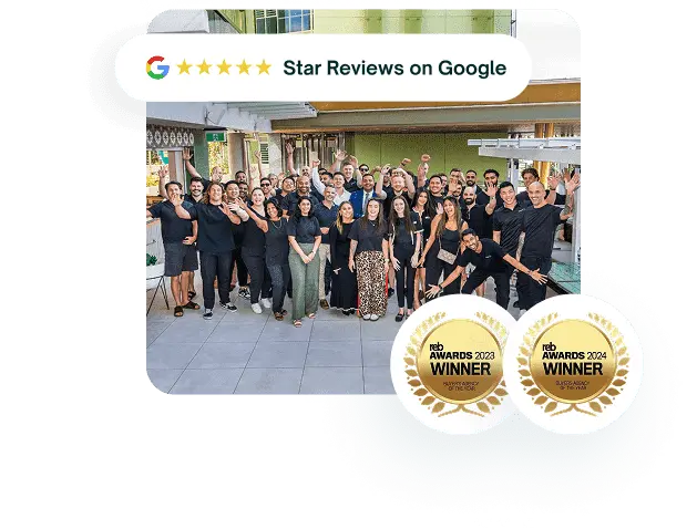 Team photo with Google reviews and REB Awards badges