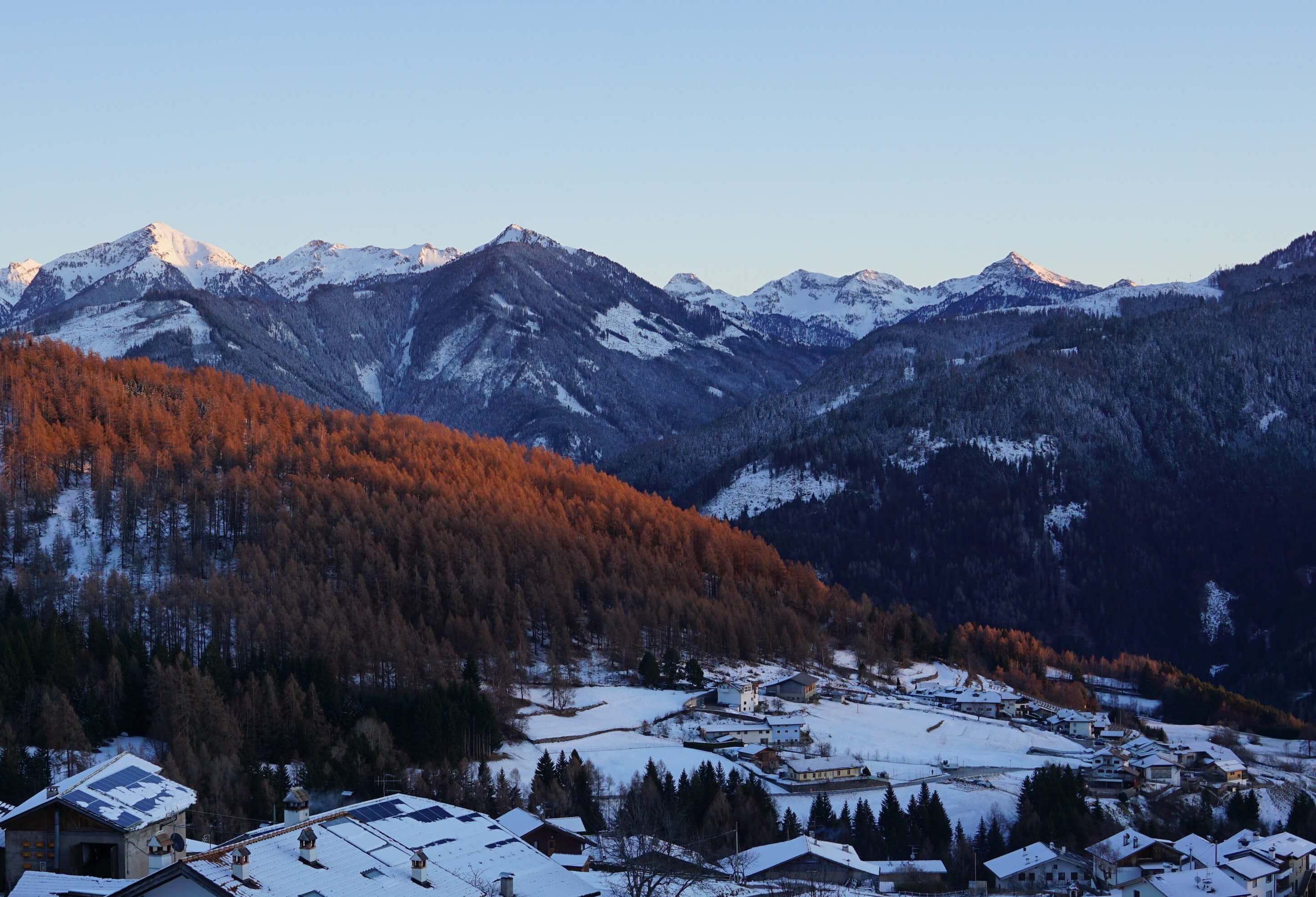 Panoramic view from the balcony over the snowy mountains