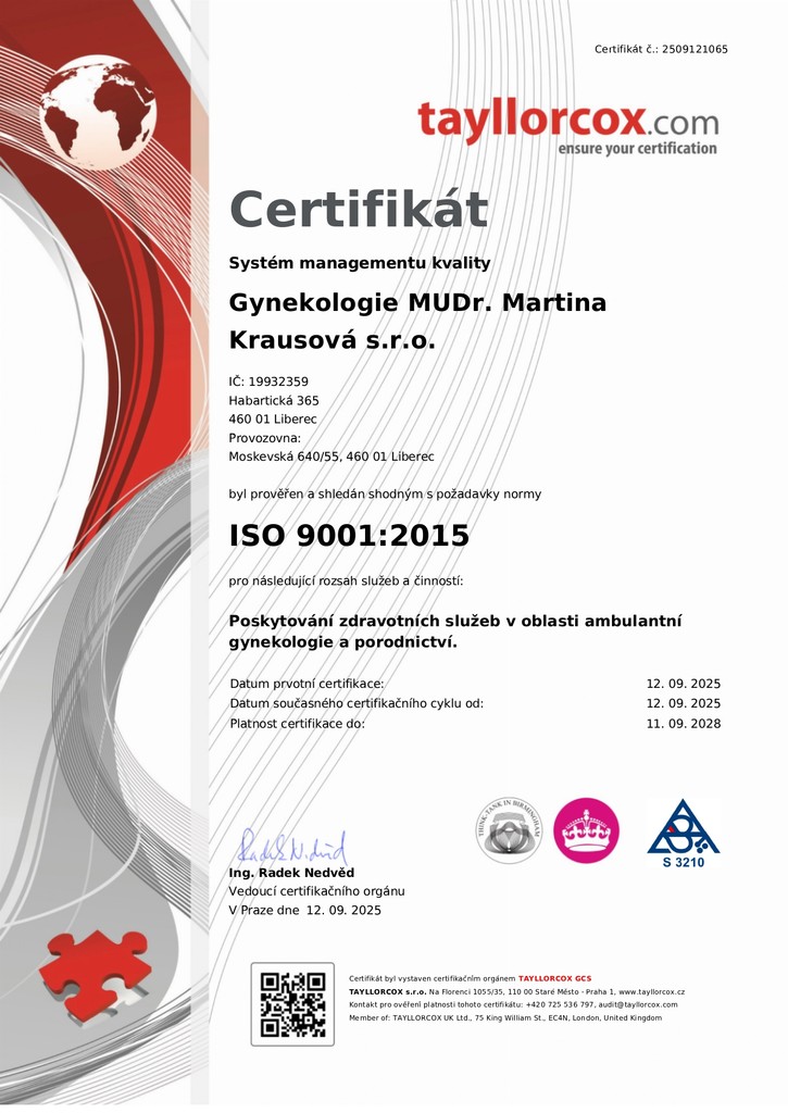 a woman in a white lab coat pointing at something