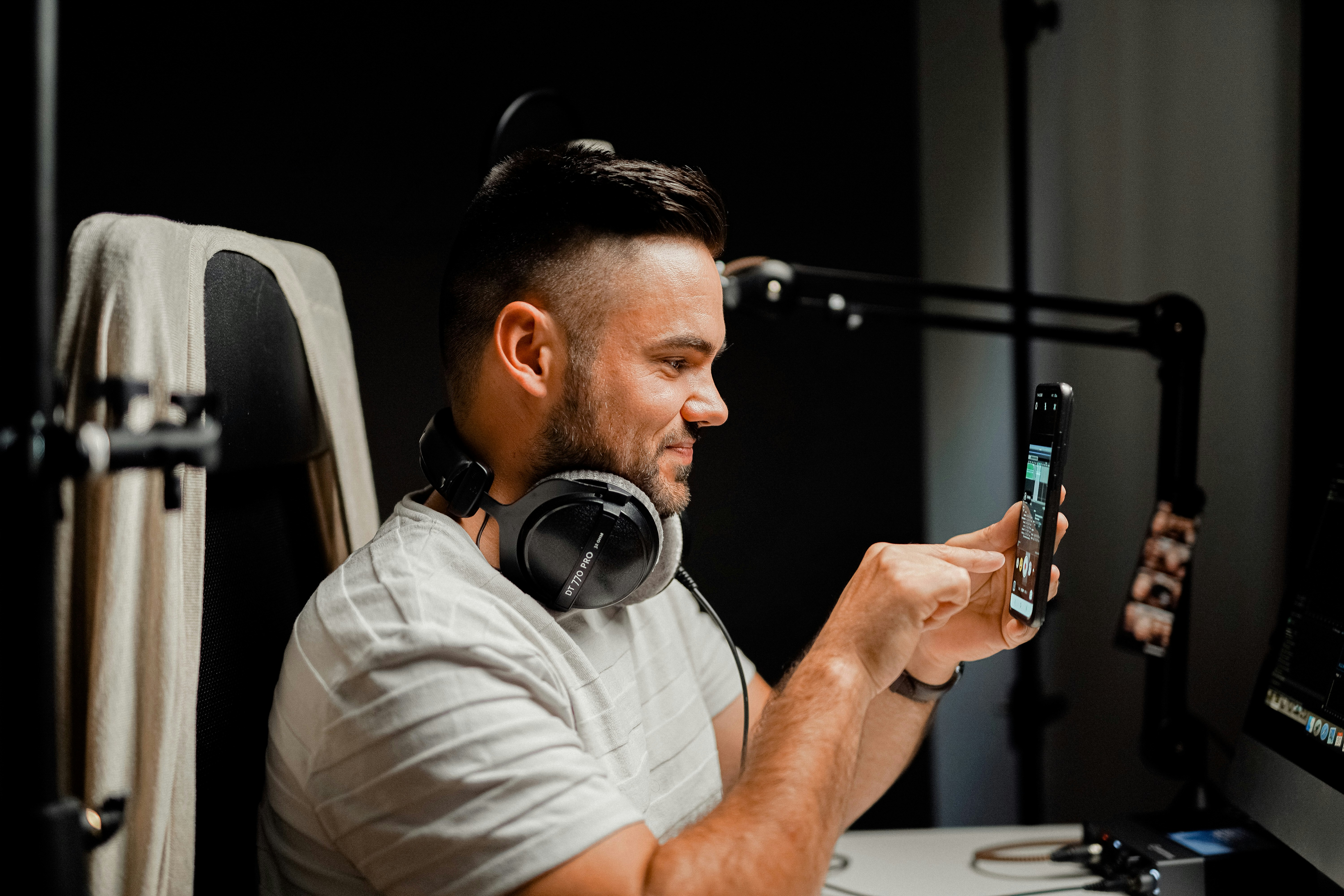 content creator looking at his tiktok feed - How To Make Money On Tiktok