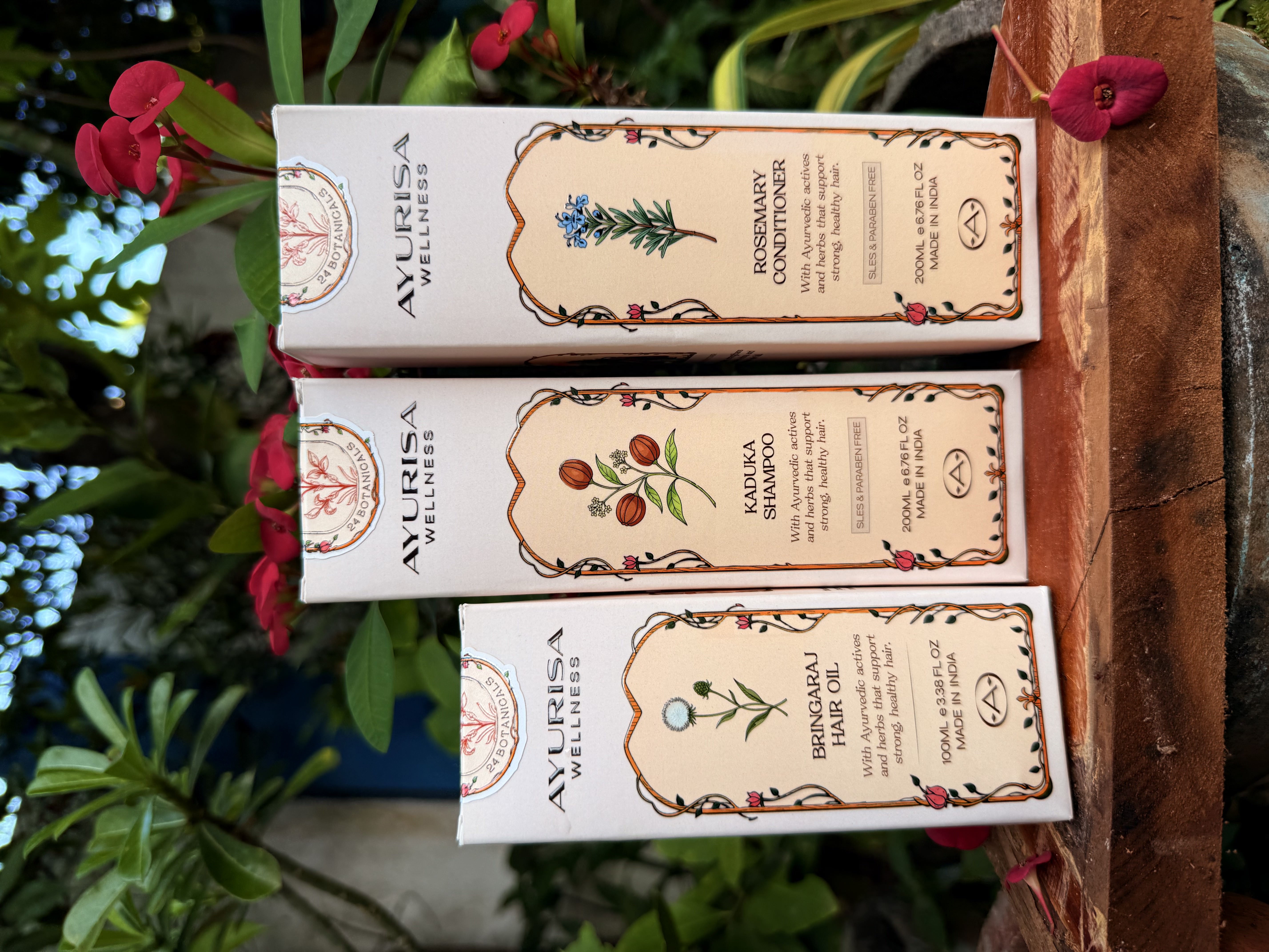 Clear plastic cup with red liquid on a red background