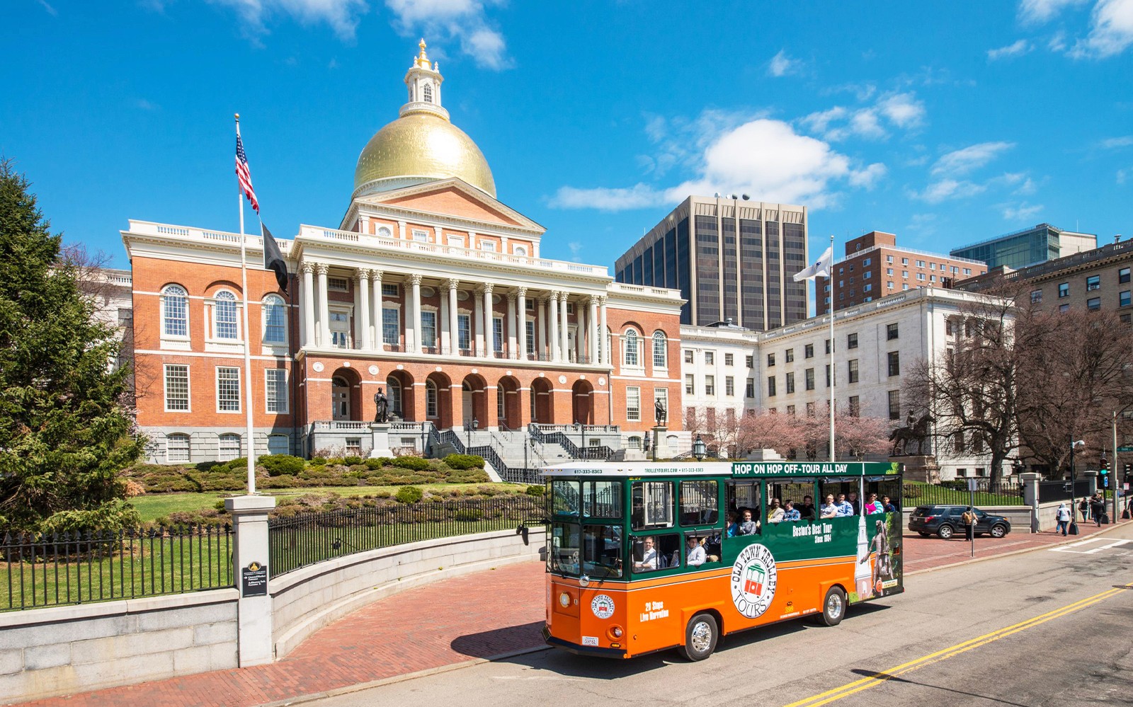 Boston Old Town Trolley passing Massachusetts State House.