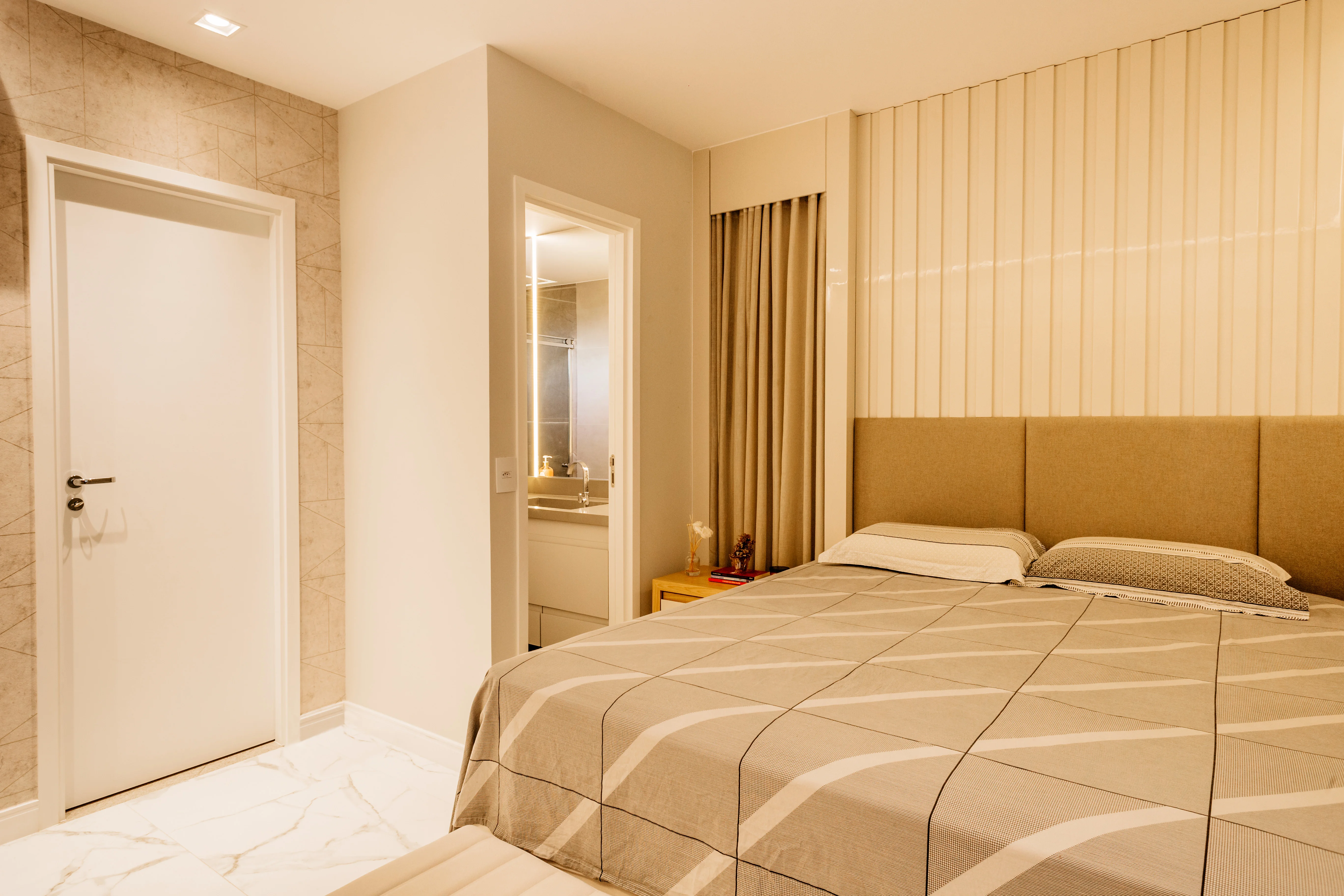 Cream modern room with an adjoining bathroom