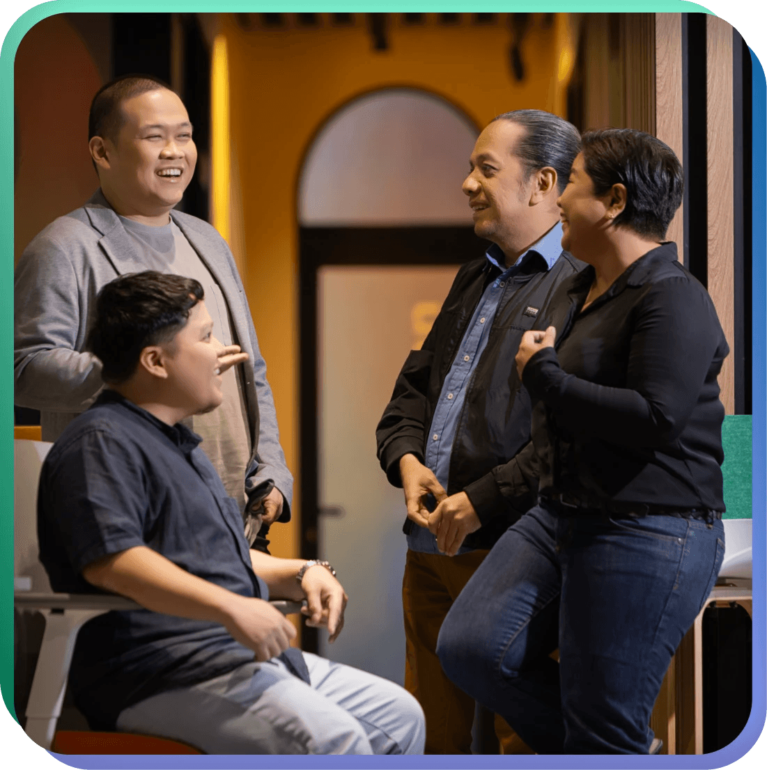 The academy mentors talking with one another.