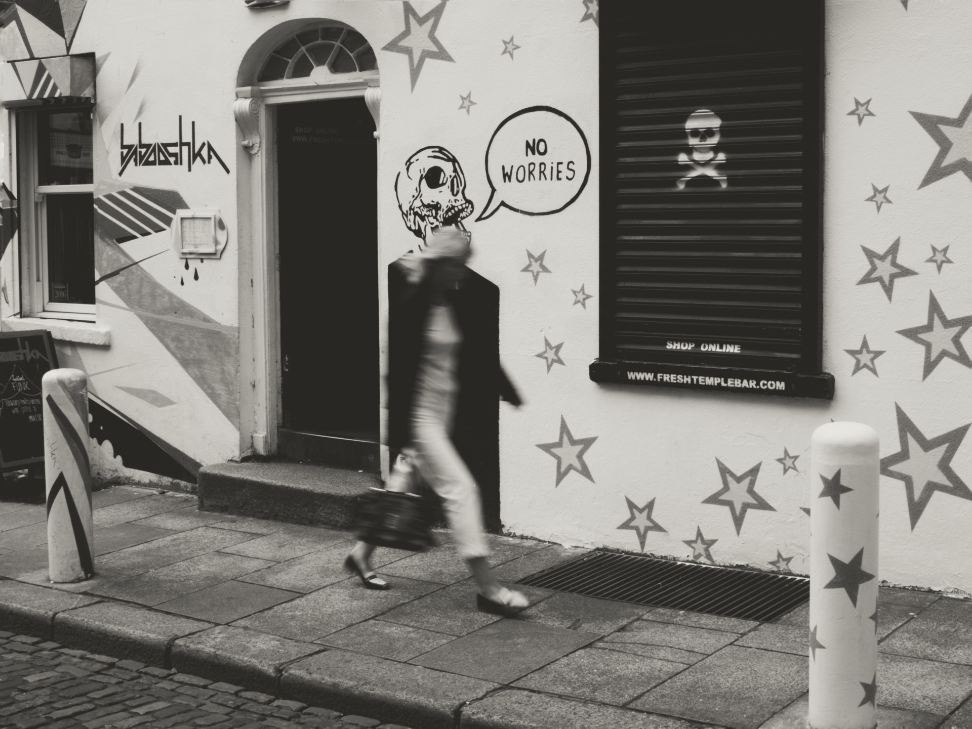 Photo of a lady walking on the street