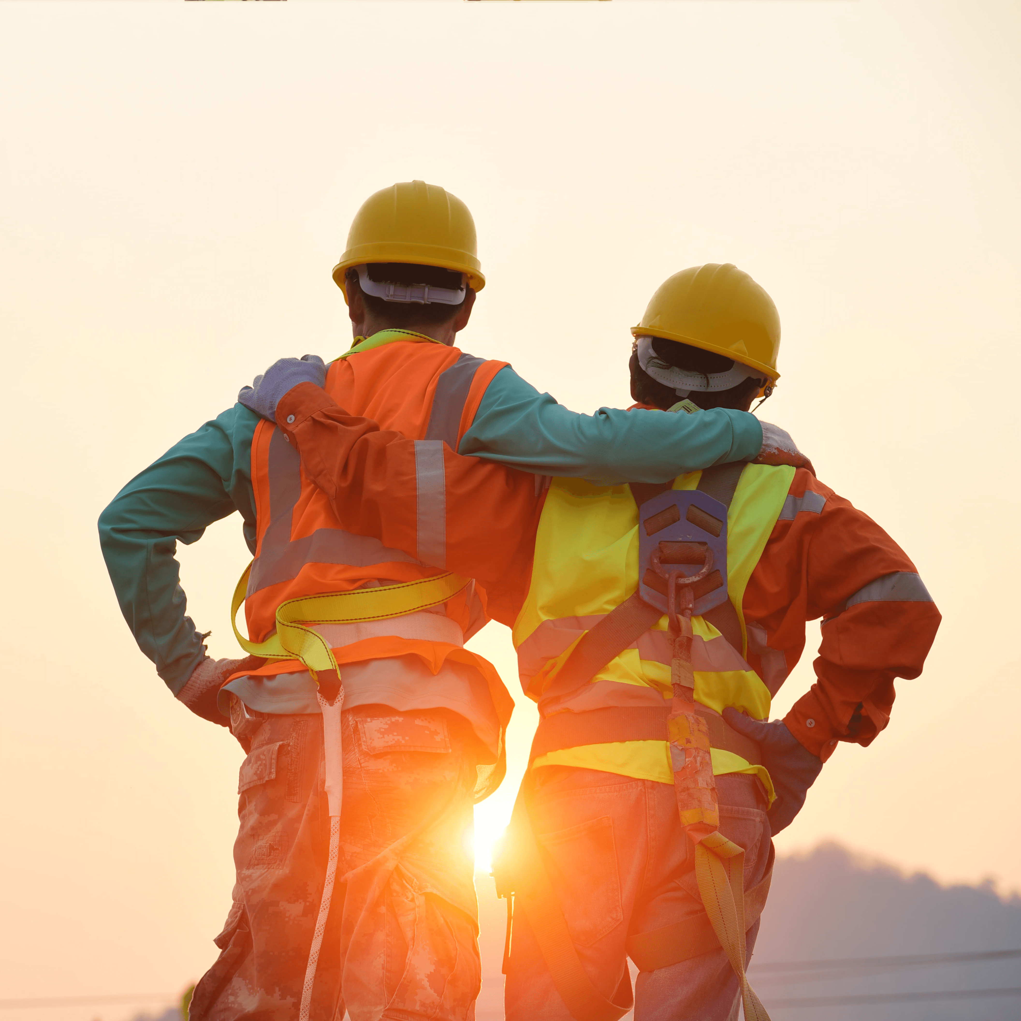 Engineers in yellow helmet and the best greetings with the warm handshake