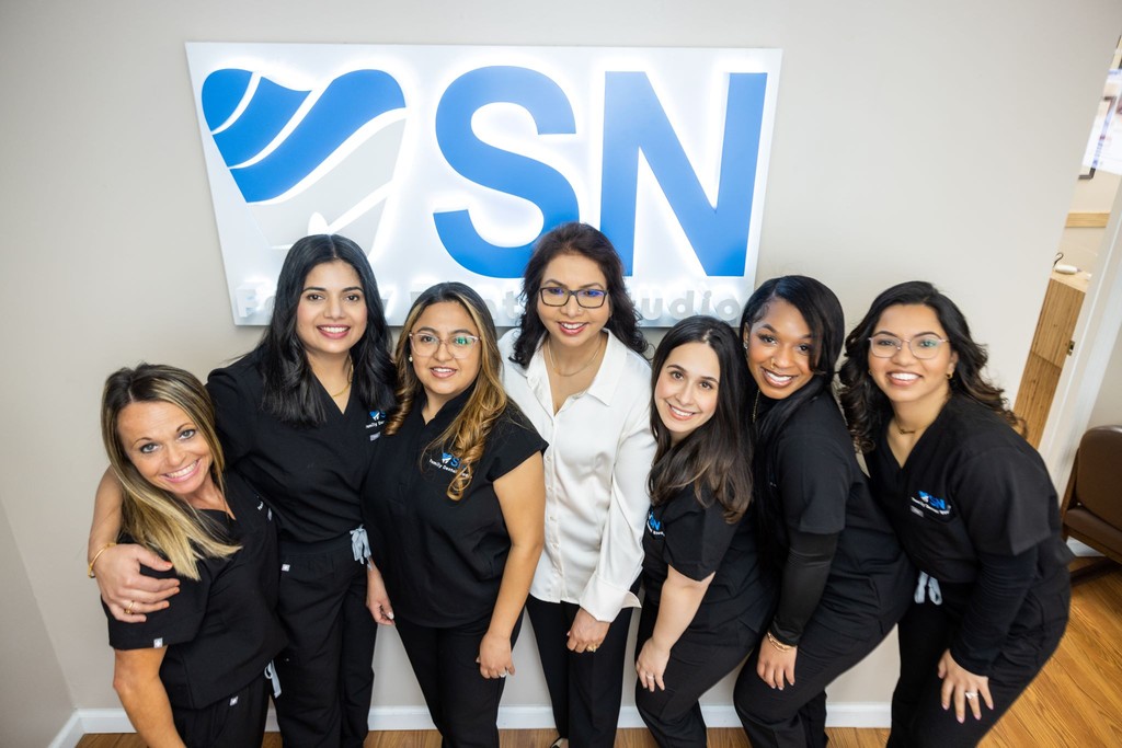 SN Family Dental Team Posing in Milltown NJ Practice