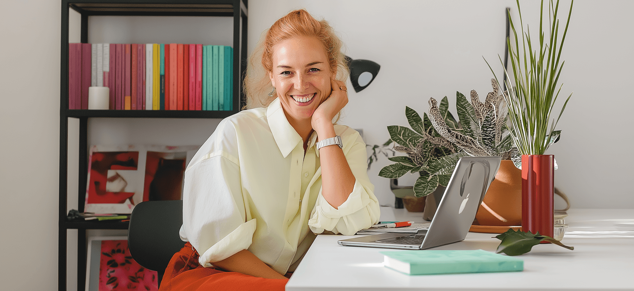 A woman smilling in a offiice