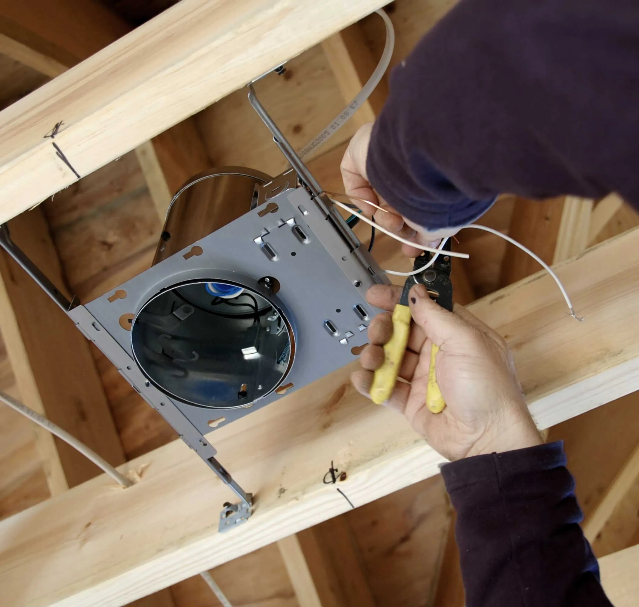 Electrician Installing Light