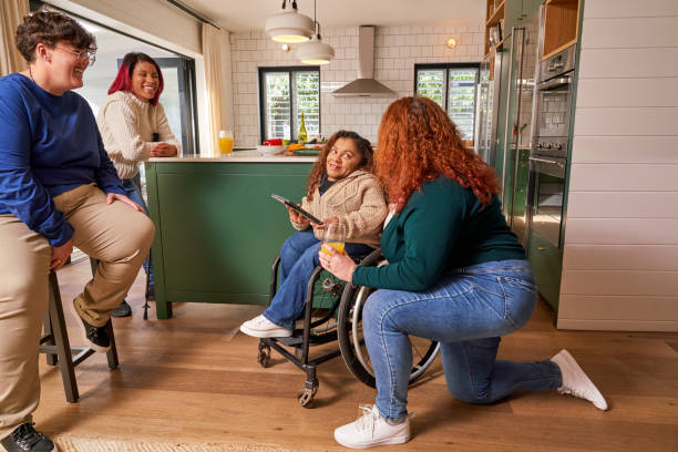 a couple of people standing next to a motorcycle