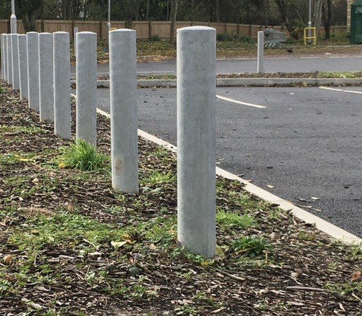 Silver steel security bollard.