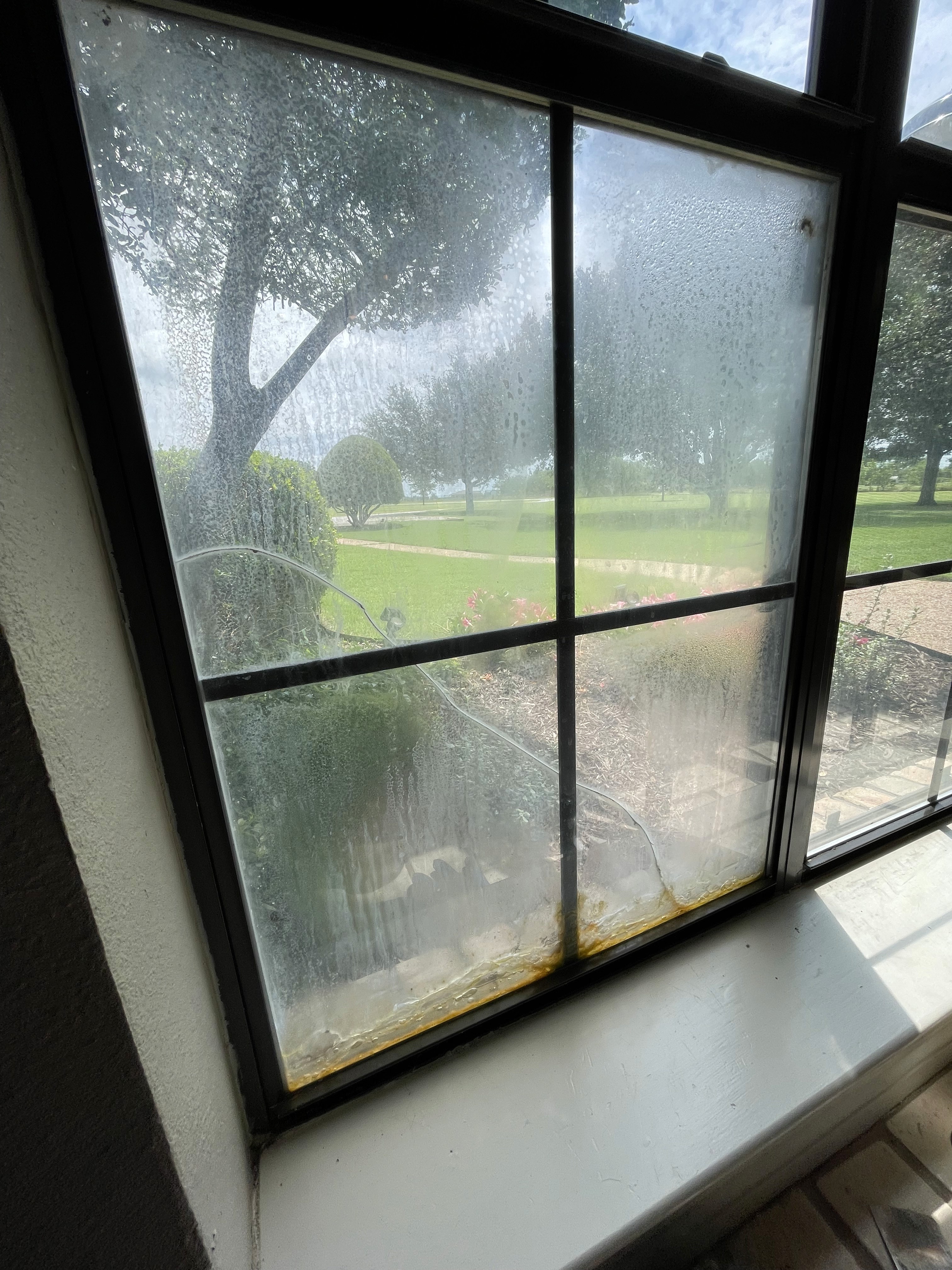 Before foggy window glass repair in Flowermound Texas
