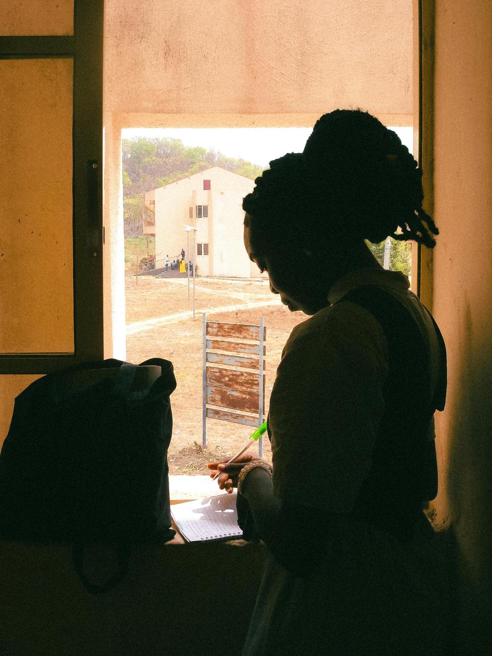 a black and white living room with a large tv