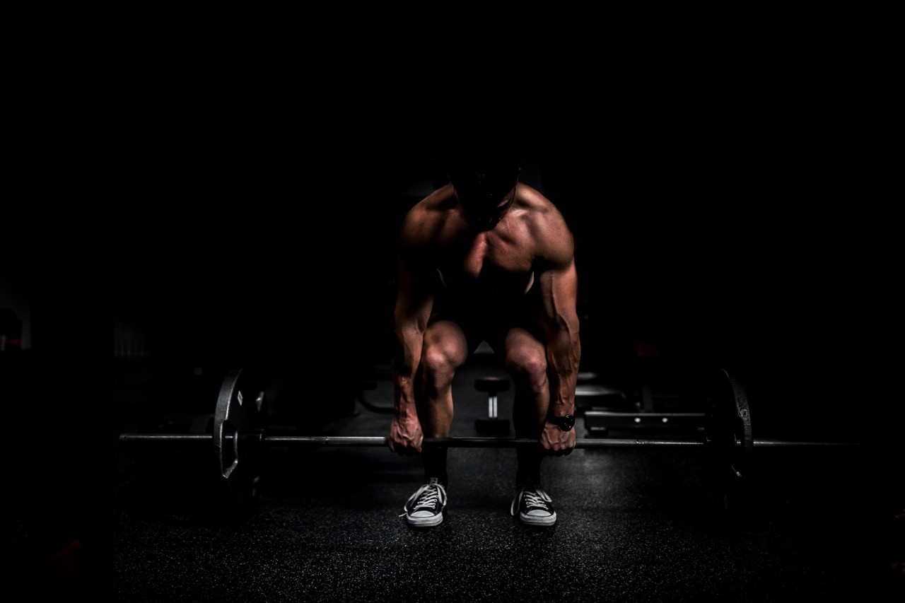 a person doing weight lifting
