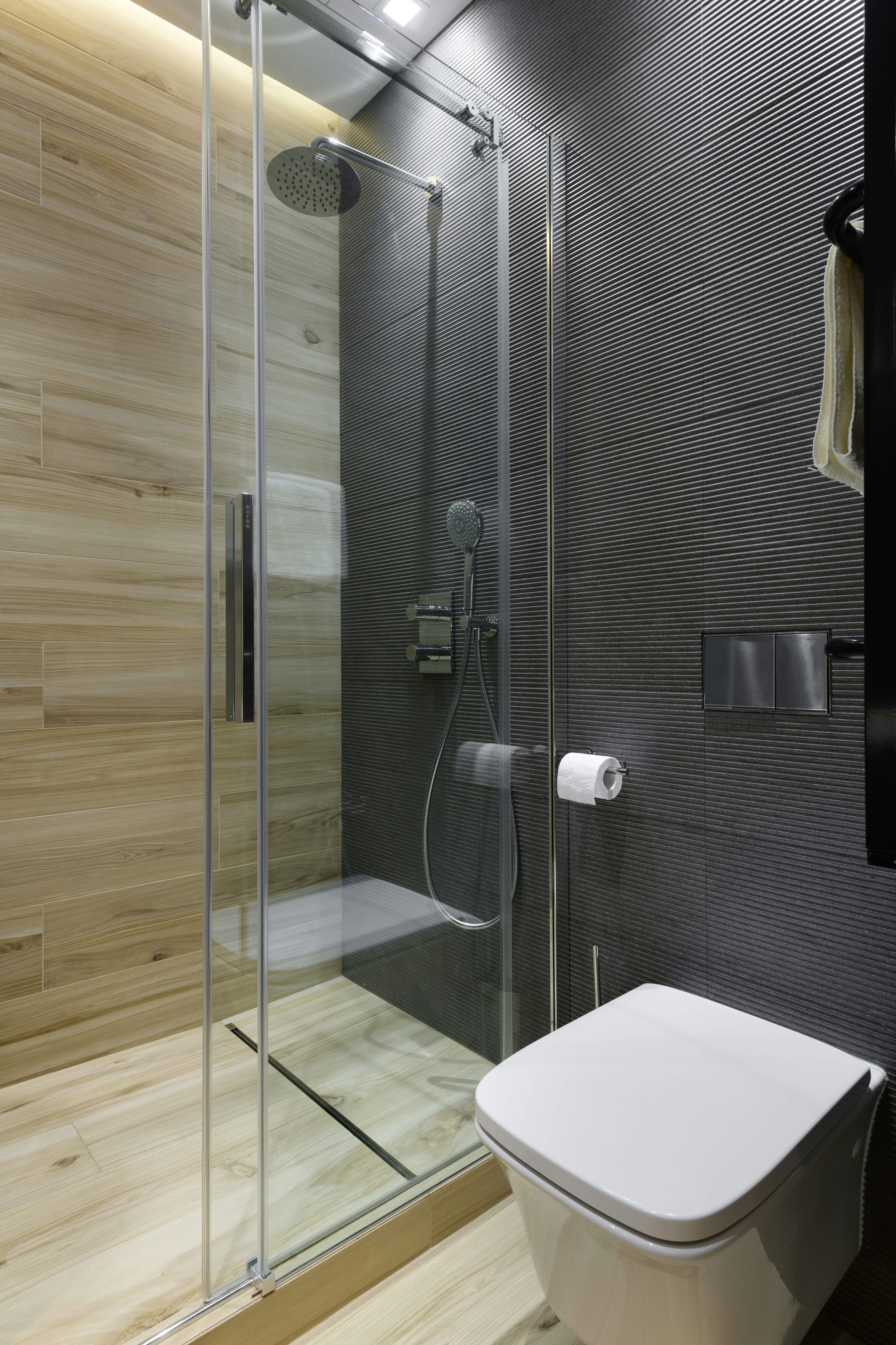 white ceramic toilet bowl near vanity combo