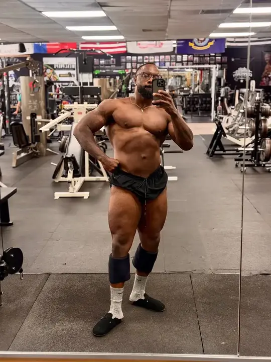 Pierre, Big Tex Gym member posing on the gym floor