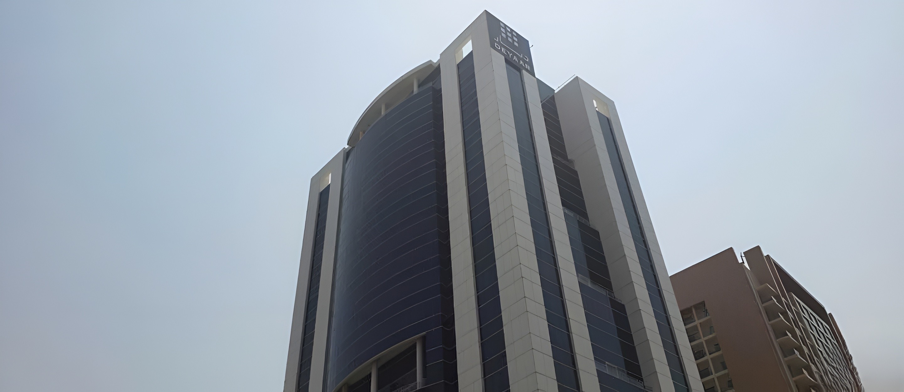 Fifty One Tower from canal. Office & retail space in Business Bay available for lease. Contact our agent.