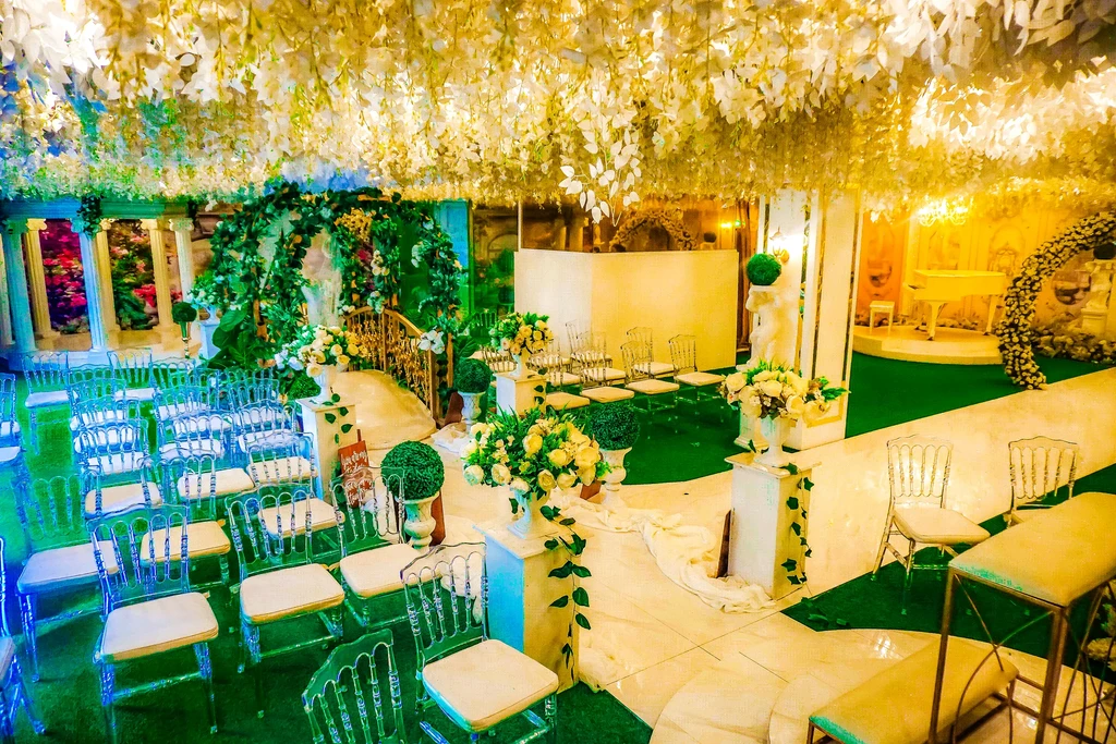 Garden ceremony setup with white and teal styling at Celestia Hall, Stalla Suites QC