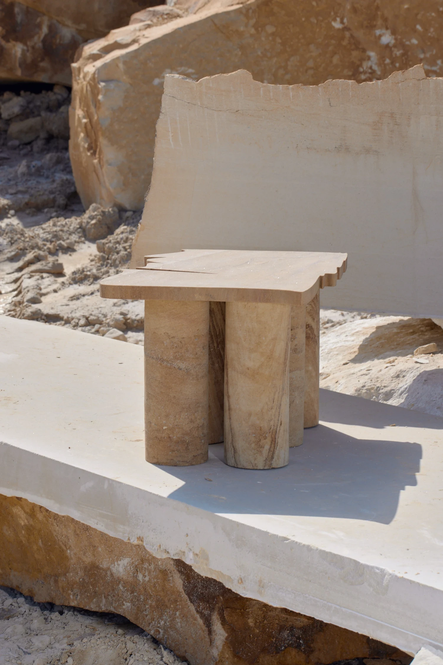 Close-up of Sand Preludium low table showing natural texture and refined stone surface finish by Jiri Krejcirik