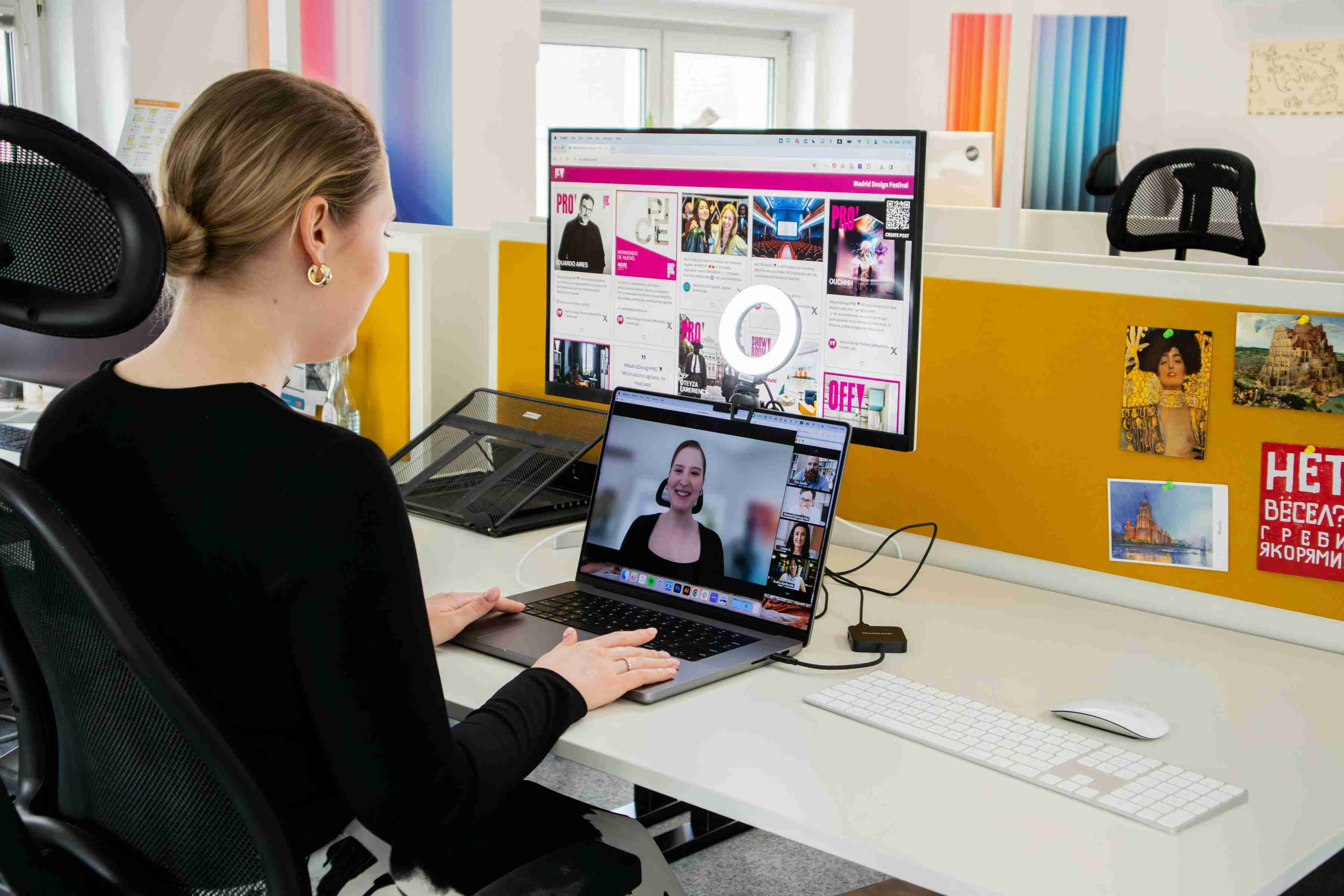 woman in an office taking part in a live webinar