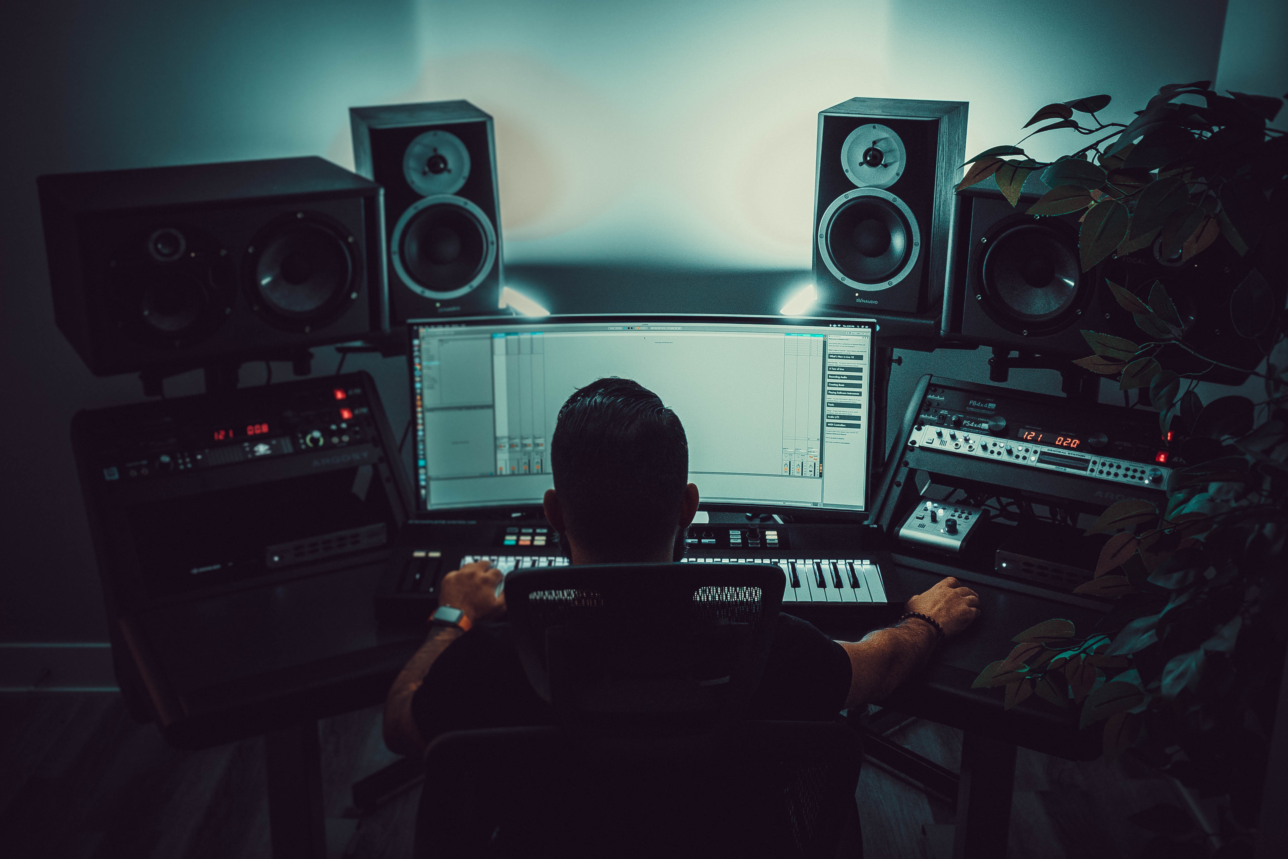 Man in studio setup researching about male voice types