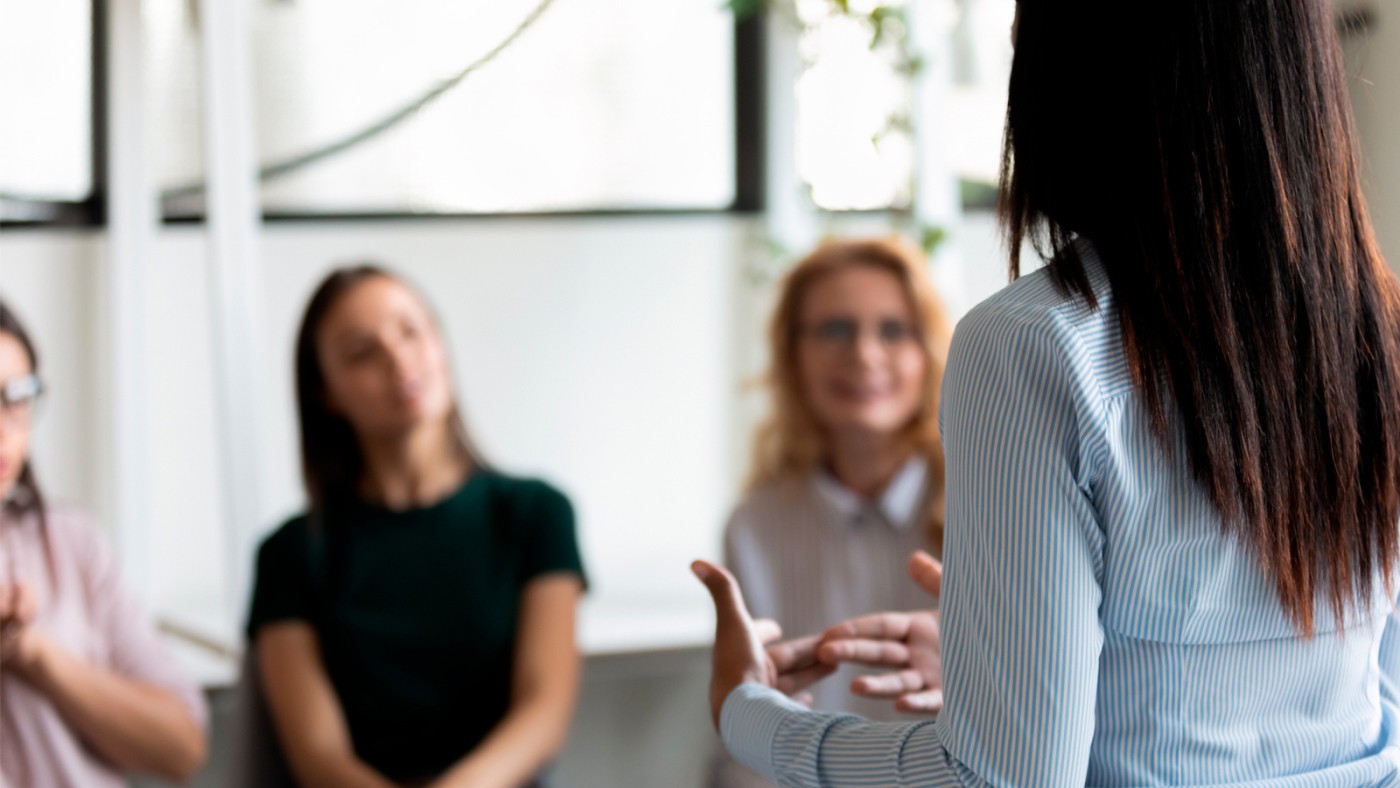 Female delivering a training programme