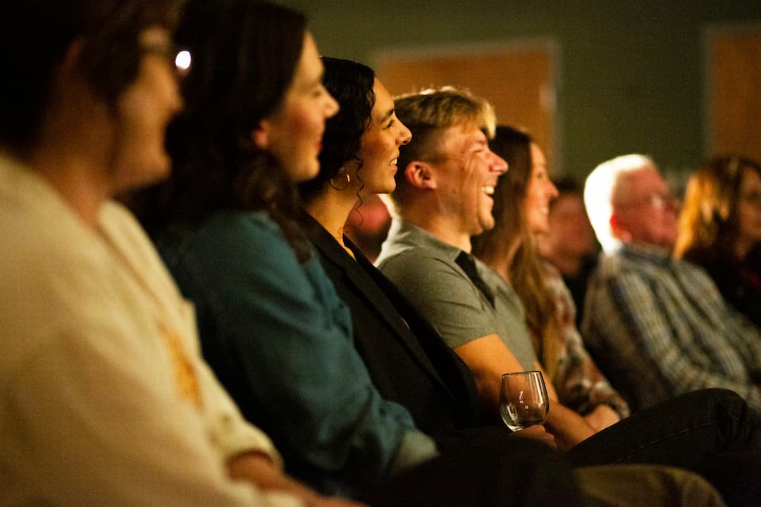 A row of audience members at St Pete Standup