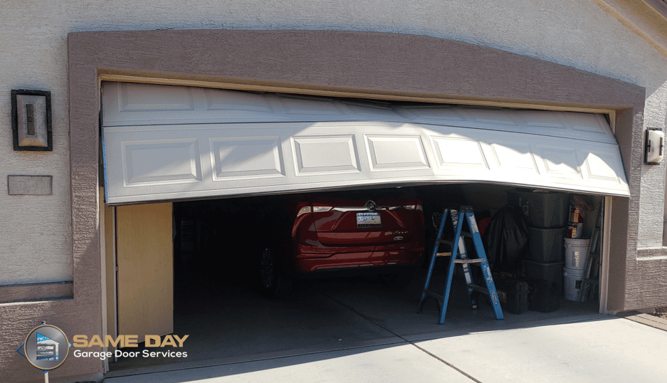 Garage Door Damage||bent section