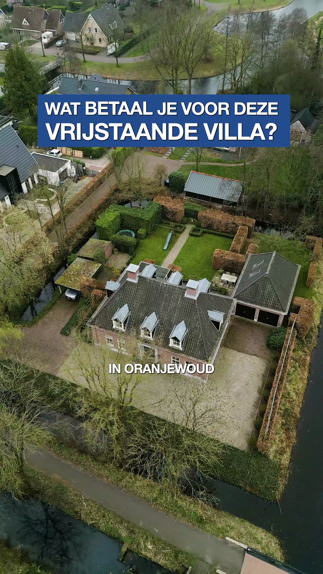 Luchtbeeld van een villa met een prijsvraag