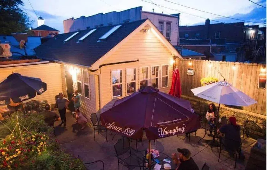 Outdoor patio in the evening with umbrellas
