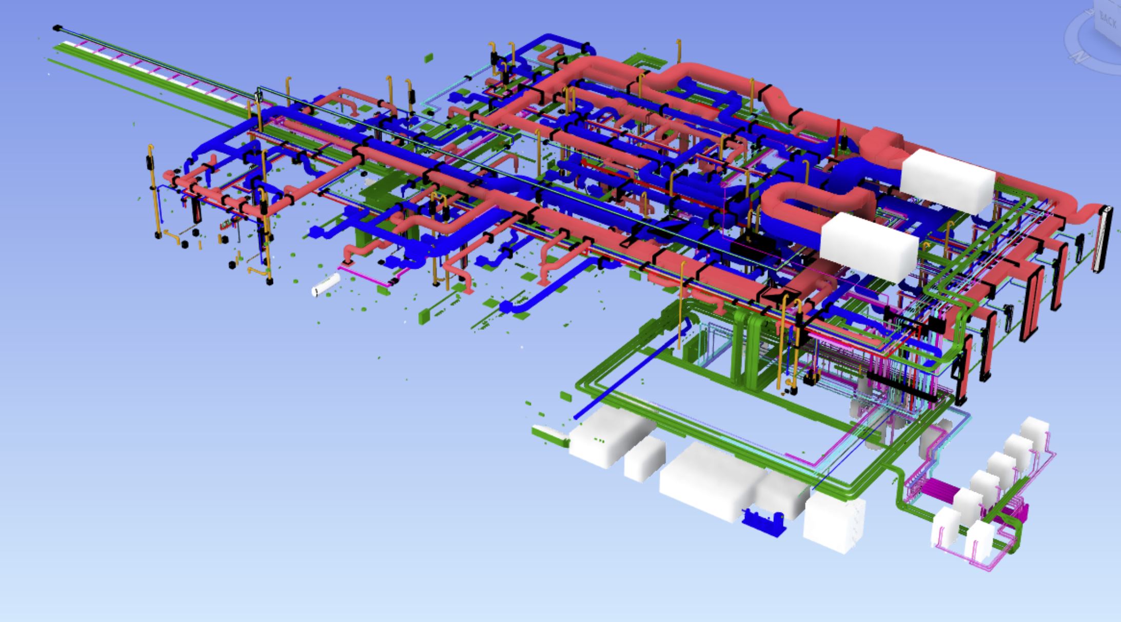 A man stands while two people sit at a table in an office setting, smiling and engaged in conversation. The mood is friendly and collaborative.